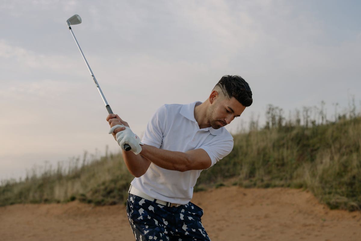 PGA professional giving a golf lesson